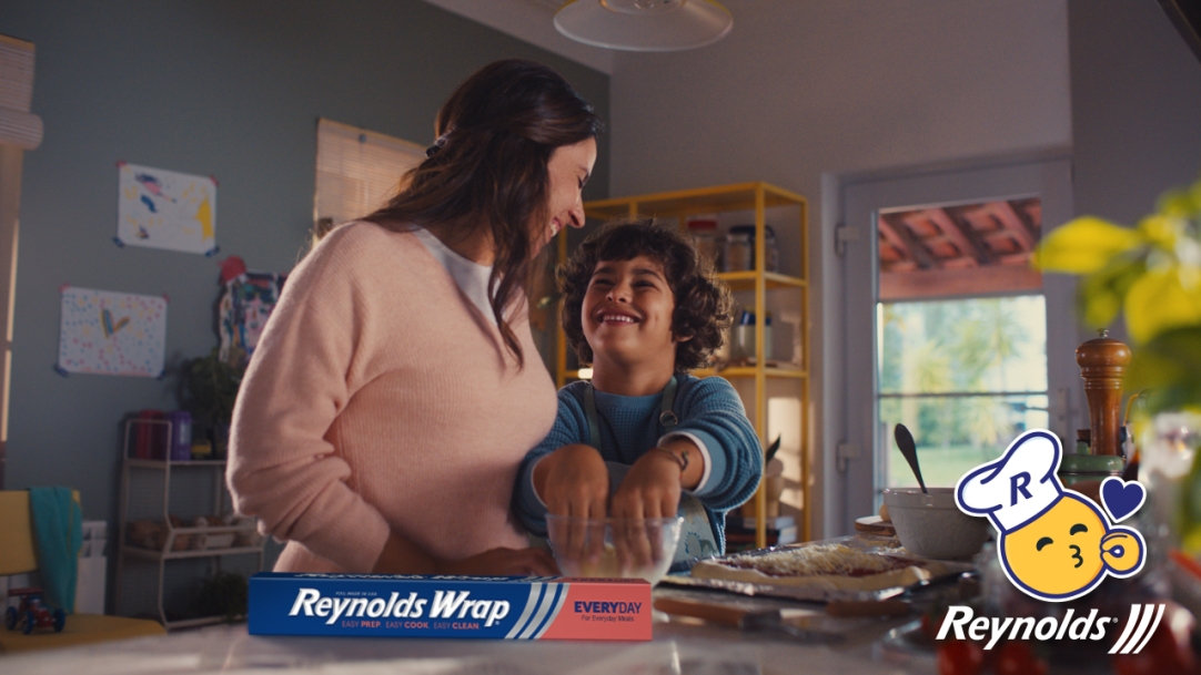 Mom and son making a pizza 