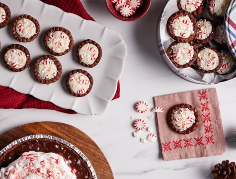 Peppermint cookies displayed on a platter and tin container