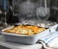 Gratinated food on a pan with aluminum foil